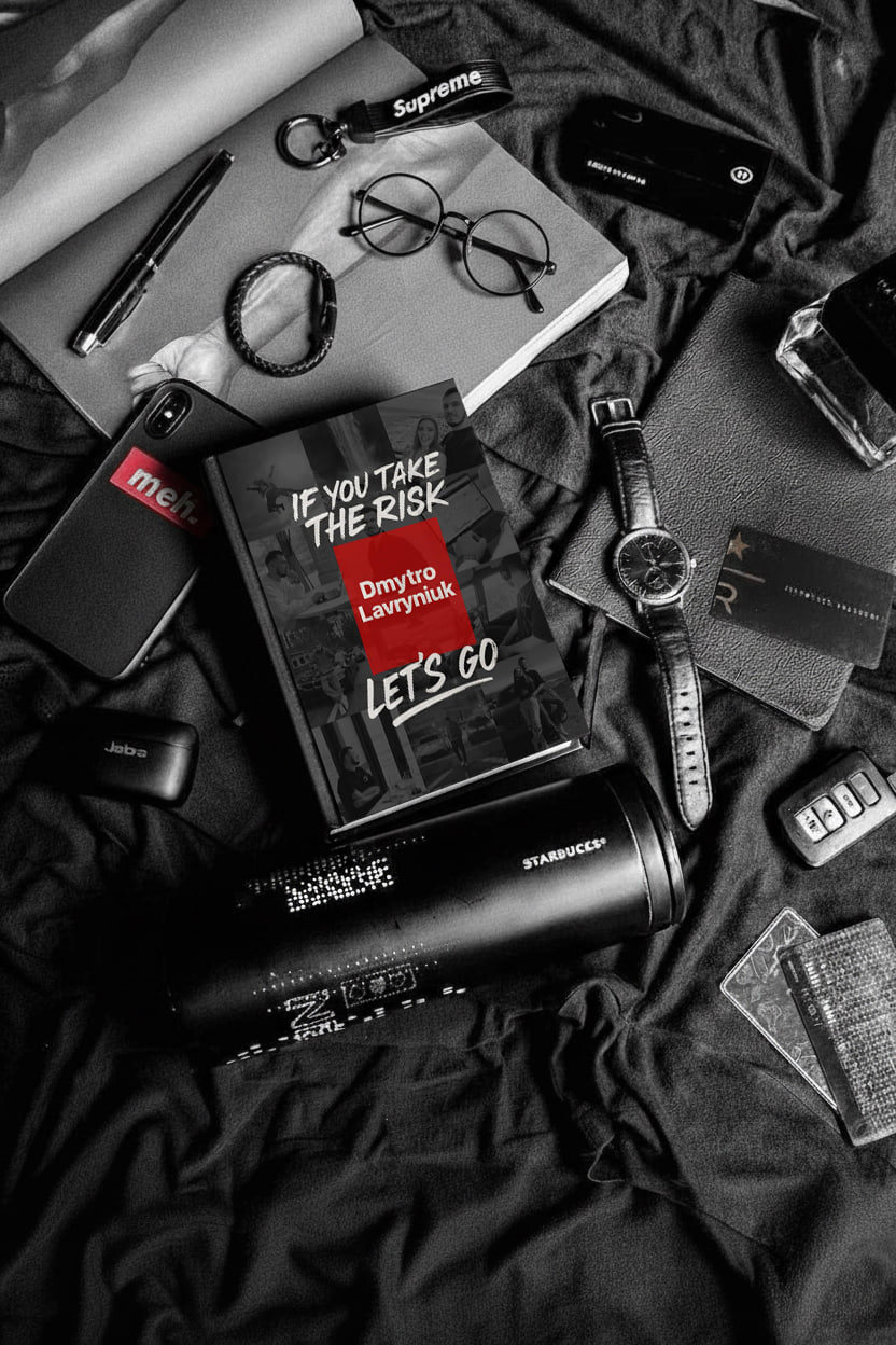 The book in an everyday-carry flatlay